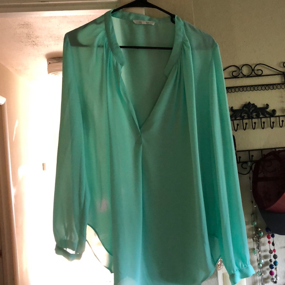 Teal shirt, brand: olivaceous